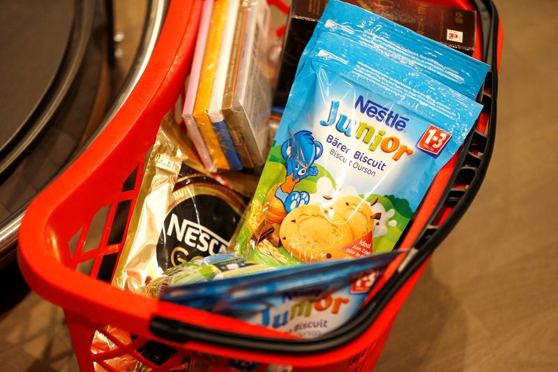 &copy; Reuters. FILE PHOTO: Shopping bag with Nestle products is pictured in the supermarket of Nestle headquarters in Vevey, Switzerland, February 13, 2020. REUTERS/Pierre Albouy/File Photo