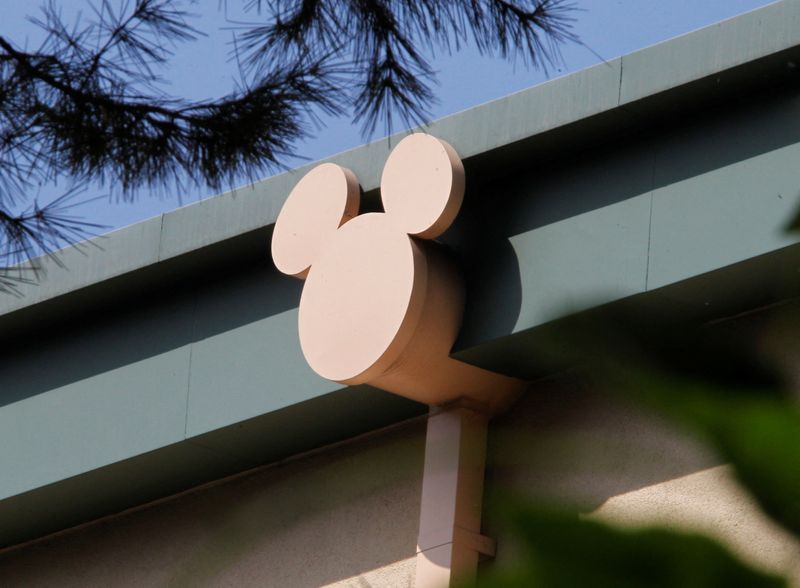 &copy; Reuters. FILE PHOTO: A rain spout stylized with the outline of Disney character Mickey Mouse is seen on a building at The Walt Disney Co. studios in Burbank, California August 9, 2011.  REUTERS/Fred Prouser