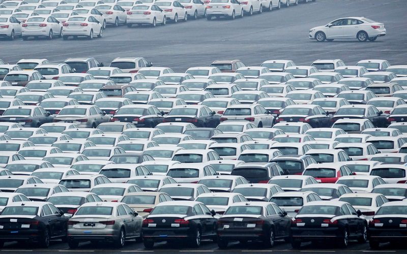 &copy; Reuters. FILE PHOTO: Newly manufactured cars are seen at the automobile terminal in the port of Dalian, Liaoning province, China July 9, 2018.  REUTERS/Stringer