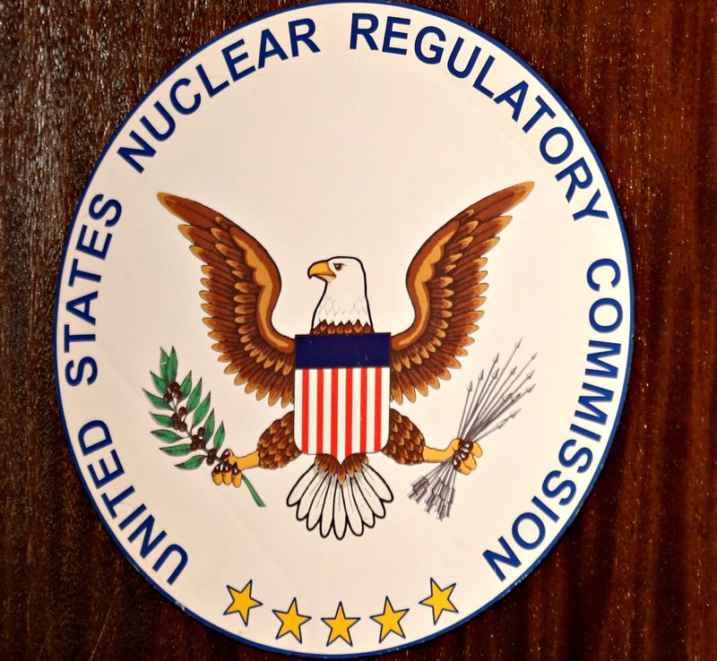 © Reuters. FILE PHOTO: The logo of the U.S. Nuclear Regulatory Commission is shown on the podium during a public meeting hosted by the  U.S. Nuclear Regulatory Commission in Carlsbad, California September 26, 2013. REUTERS/Mike Blake/File Photo