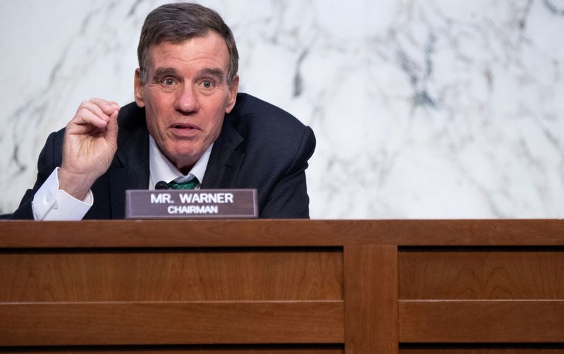 &copy; Reuters. FILE PHOTO: U.S. Senator Mark Warner, Democrat of Virginia and Chairman of the Senate Select Committee on Intelligence, holds a hearing about worldwide threats, on Capitol Hill in Washington, DC, U.S., April 14, 2021. Saul Loeb/Pool via REUTERS/File Photo