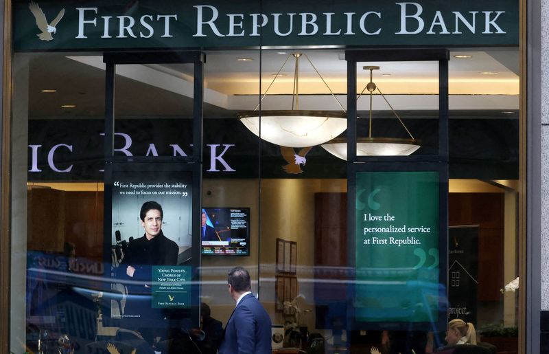 &copy; Reuters. FILE PHOTO: A person walks past the First Republic Bank branch in Midtown Manhattan in New York City, New York, U.S., March 13, 2023. REUTERS/Mike Segar/File Photo
