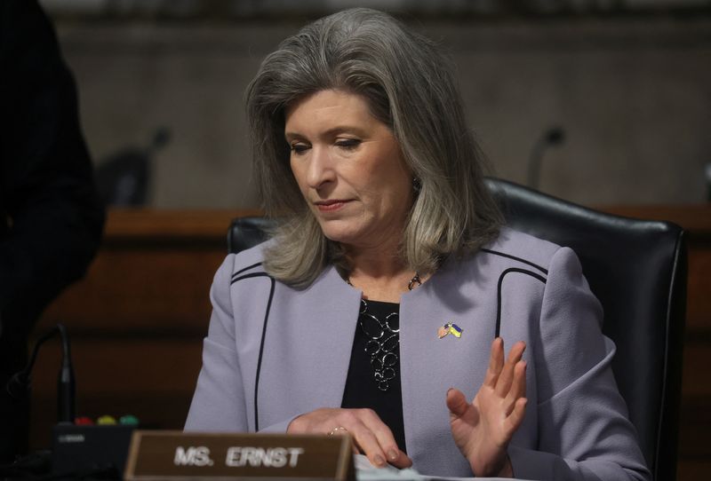 &copy; Reuters. FILE PHOTO: U.S. Sen. Joni Ernst (R-IA) reads as U.S. Space Force Lt. Gen. Bradley Saltzman testifies before a Senate Armed Services Committee hearing on his nomination to be general and chief of space operations at the Defense Department on Capitol Hill 