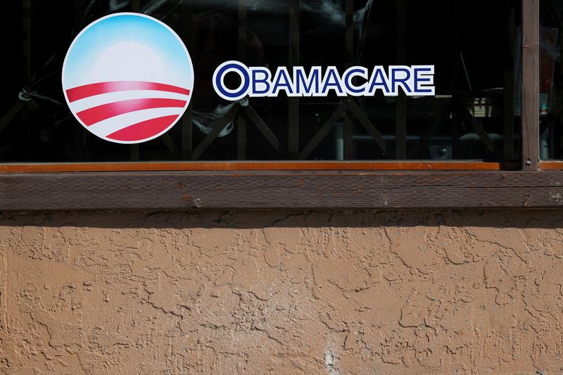 &copy; Reuters. FILE PHOTO: A sign on an insurance store advertises Obamacare in San Ysidro, San Diego, California, U.S., October 26, 2017. REUTERS/Mike Blake/File Photo