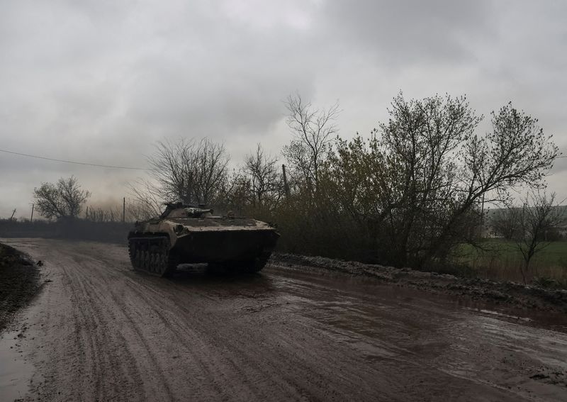 &copy; Reuters. FILE PHOTO: A Ukrainian serviceman rides inside a BMP-1 infantry fighting vehicle on a road to the front line town of Bakhmut, amid Russia's attack on Ukraine, in Donetsk region, Ukraine April 21, 2023. REUTERS/Sofiia Gatilova/File Photo