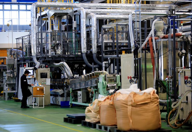 &copy; Reuters. FILE PHOTO: A man works at a factory line of Biomass Resin Fukushima's factory in Namie, about 7 km from the crippled Fukushima Dai-Ichi nuclear plant, Fukushima Prefecture, Japan February 28, 2023. REUTERS/Kim Kyung-Hoon