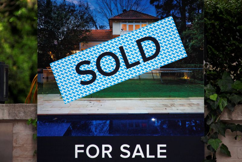 &copy; Reuters. FILE PHOTO: A real estate agent's sign outside a house shows that it has recently been sold, in Sydney October 13, 2014. REUTERS/David Gray/File Photo