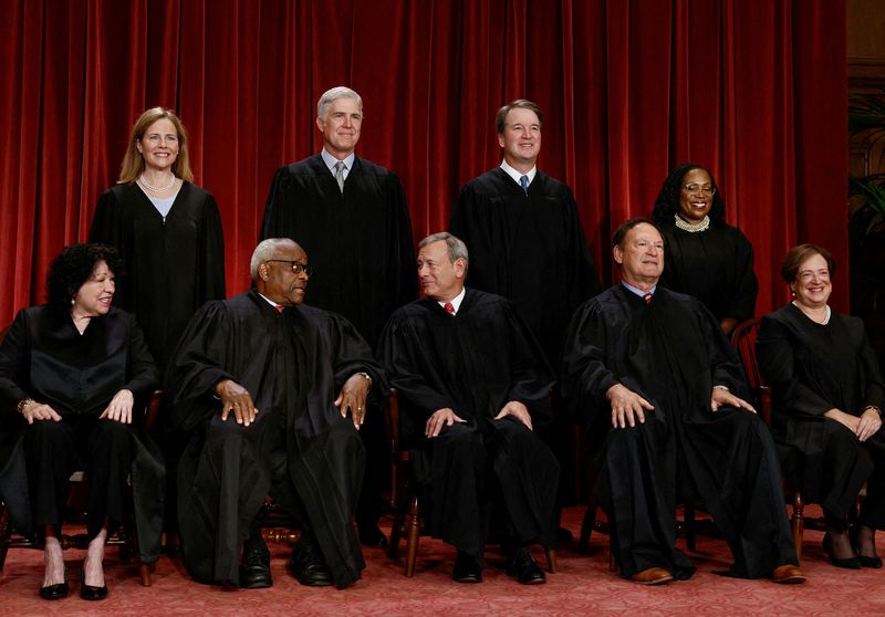 &copy; Reuters. FILE PHOTO: U.S. Supreme Court justices pose for their group portrait at the Supreme Court in Washington, U.S., October 7, 2022. Seated (L-R): Justices Sonia Sotomayor, Clarence Thomas, Chief Justice John G. Roberts, Jr., Samuel A. Alito, Jr. and Elena Ka