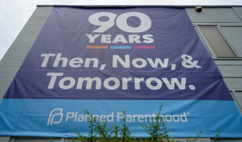 &copy; Reuters. FILE PHOTO: A "90 years of service" poster hangs on the side of Planned Parenthood after the United States Supreme Court ruled in the Dobbs v Women's Health Organization abortion case, overturning the landmark Roe v Wade abortion decision, in St. Louis, M