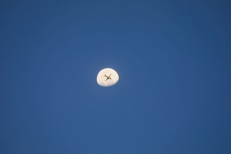 &copy; Reuters. FILE PHOTO: View of the moon while a strike aircraft prepares for an aerial bombardment as clashes between the paramilitary Rapid Support Forces and the Sudanese army continue, in Khartoum, Sudan, May 1, 2023. REUTERS/Stringer 