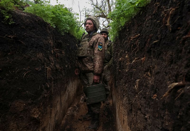 Fear recedes for Ukraine's volunteers, for whom war is 'just a job'