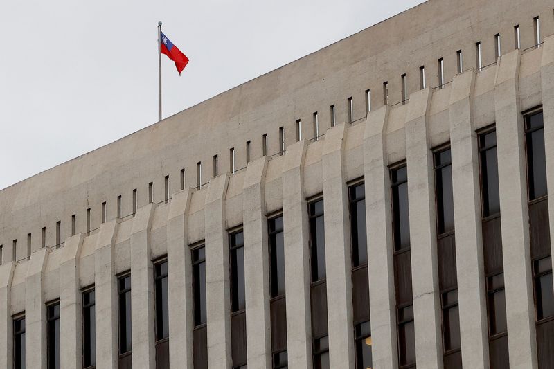 &copy; Reuters. FILE PHOTO: A Taiwanese flag is seen on top of Taiwan's central bank in Taipei, Taiwan, December 14, 2022. REUTERS/Ann Wang