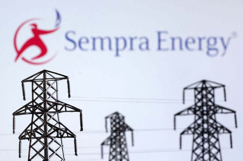 &copy; Reuters. FILE PHOTO: Electric power transmission pylon miniatures and Sempra Energy logo are seen in this illustration taken, December 9, 2022. REUTERS/Dado Ruvic/Illustration