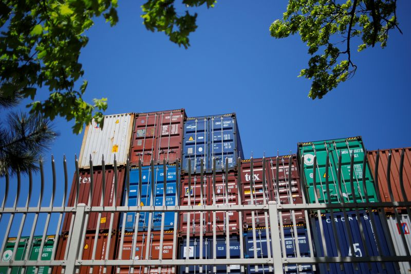 &copy; Reuters. FILE PHOTO: Shipping containers, including one labelled "China Shipping" and another "Italia", are stacked at the Paul W. Conley Container Terminal in Boston, Massachusetts, U.S., May 9, 2018.  REUTERS/Brian Snyder