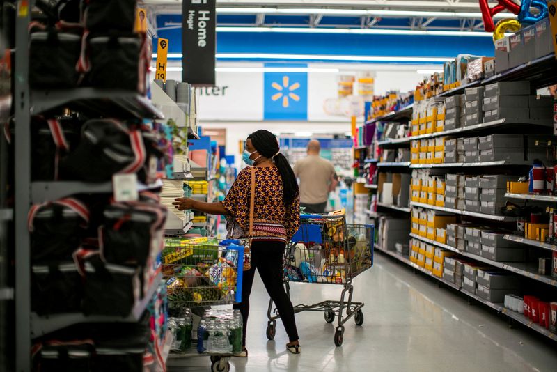 &copy; Reuters. FILE PHOTO: A shopper is seen wearing a mask while shopping at a Walmart store, in North Brunswick, New Jersey, U.S. July 20, 2020. REUTERS/Eduardo Munoz/File Photo