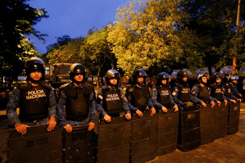 &copy; Reuters. Police stand guard outside the police station where Paraguayo Cubas (not pictured), who placed third in Paraguay's presidential elections last week, was taken after his arrest, in Asuncion, Paraguay, May 5, 2023. REUTERS/Cesar Olmedo