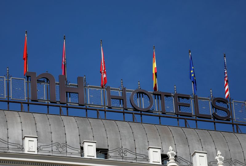 &copy; Reuters. FILE PHOTO: The NH Hotel logo is seen on top of the NH Madrid Nacional hotel in Madrid, Spain, June 14, 2018.  REUTERS/Paul Hanna
