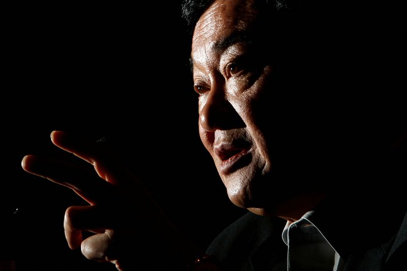 &copy; Reuters. FILE PHOTO: Thailand's former premier Thaksin Shinawatra speaks during a group interview in Tokyo August 23, 2011.  REUTERS/Yuriko Nakao/File Photo/File Photo