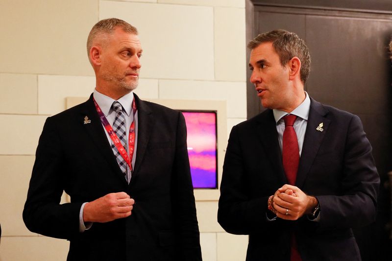 &copy; Reuters. FILE PHOTO: Australian Treasurer Jim Chalmers talks with Australian Treasury deputy secretary Luke Yeaman during the G20 Finance Ministers and Central Bank Governors Meeting in Nusa Dua, Bali, Indonesia, 16 July 2022. Made Nagi/Pool via REUTERS