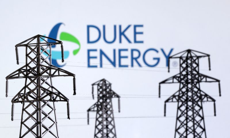 &copy; Reuters. FILE PHOTO: Electric power transmission pylon miniatures and Duke Energy logo are seen in this illustration taken, December 9, 2022. REUTERS/Dado Ruvic/Illustration