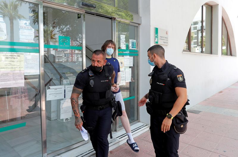 &copy; Reuters. FILE PHOTO: 22-year-old British citizen Joseph James O'Connor is lead by Spanish police officers as he leaves a court after being arrested on Wednesday in connection with an alleged July 2020 Twitter hack which compromised the accounts of high-profile pol