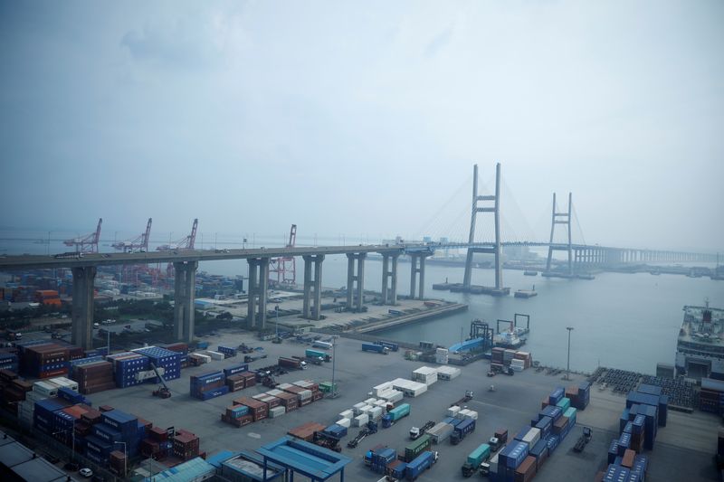 &copy; Reuters. FILE PHOTO: Cranes and shipping containers are seen at Pyeongtaek port in Pyeongtaek, South Korea, July 9, 2020. REUTERS/Kim Hong-Ji/File Photo