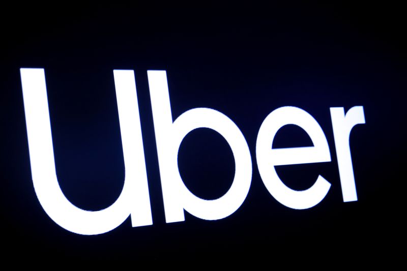 &copy; Reuters. FILE PHOTO: A screen displays the company logo for Uber Technologies Inc. on the day of it's IPO at the New York Stock Exchange (NYSE) in New York, U.S., May 10, 2019. REUTERS/Brendan McDermid