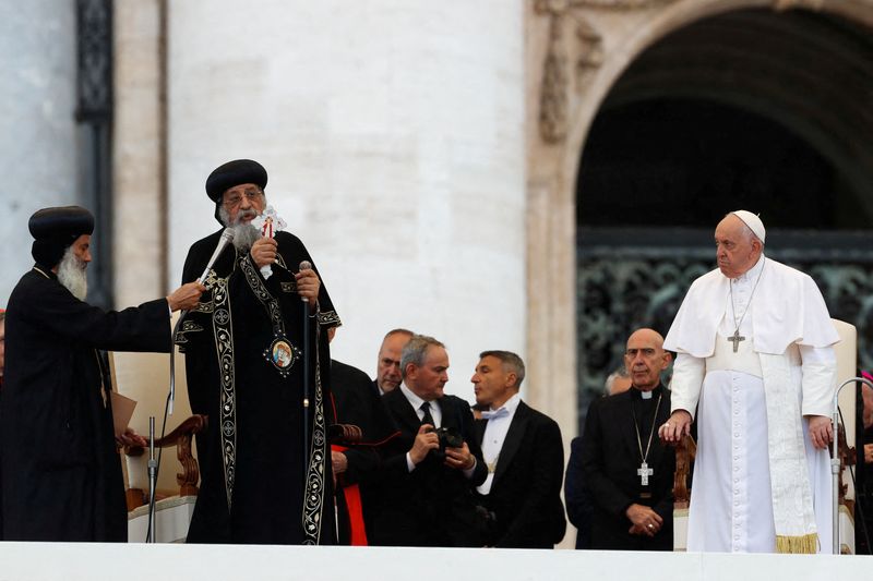 Rare day at Vatican as two popes share stage