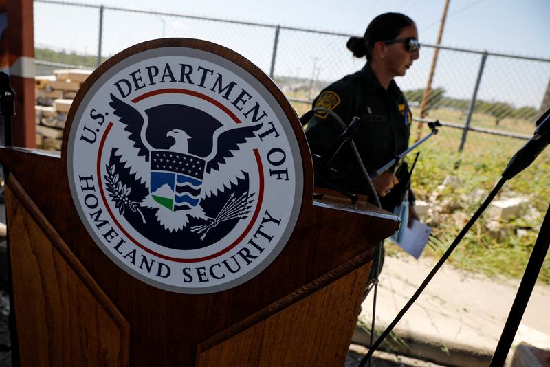 © Reuters. FILE PHOTO: The seal of the U.S. Department of Homeland Security is seen after a news conference in Del Rio, Texas, U.S., September 19, 2021. REUTERS/Marco Bello/