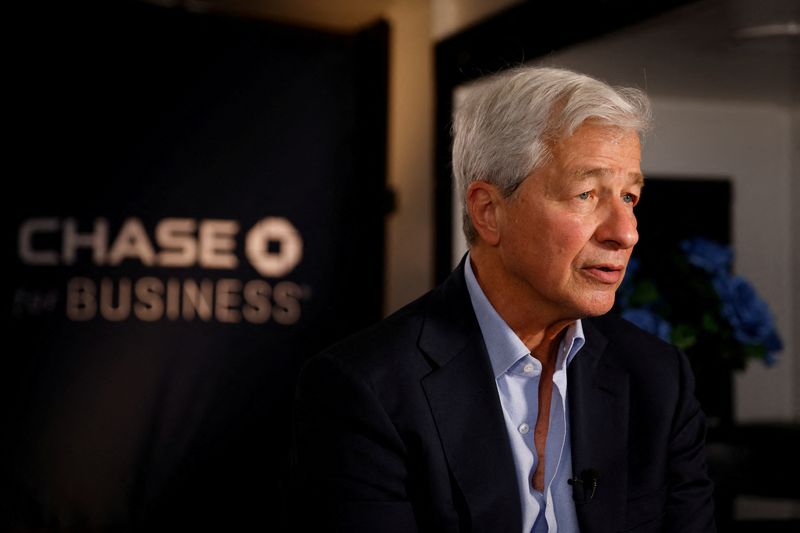 © Reuters. FILE PHOTO: Jamie Dimon, Chairman of the Board and Chief Executive Officer of JPMorgan Chase & Co., pauses as he speaks during an interview with Reuters in Miami, Florida, U.S., February 8, 2023. REUTERS/Marco Bello/File Photo