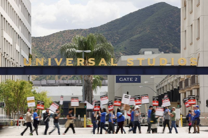 Hollywood writers try to strike a love match while picketing