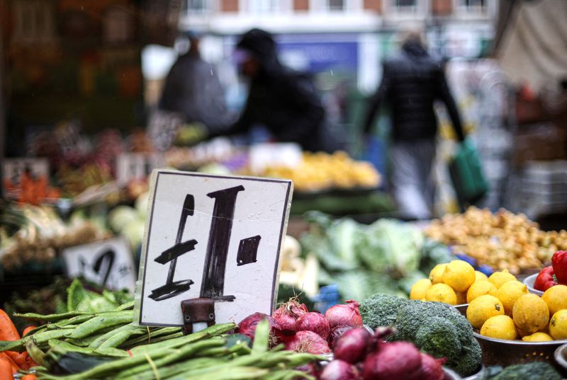 © Reuters. FILE PHOTO: A price tag is pictured at Lewisham Market amid the outbreak of the coronavirus disease (COVID-19) in London, Britain October 13, 2020. REUTERS/Hannah McKay
