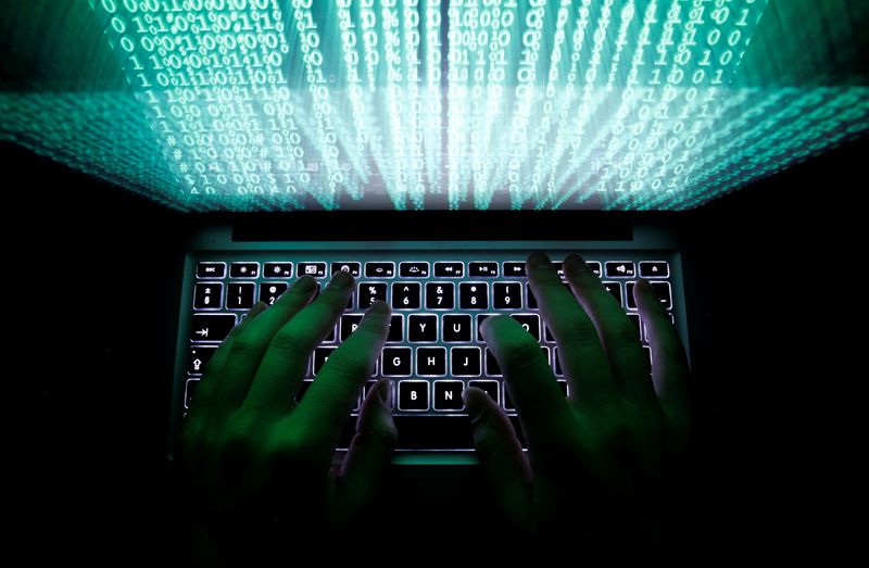 &copy; Reuters. FILE PHOTO: A man types on a computer keyboard in this illustration picture taken February 28, 2013.  REUTERS/Kacper Pempel/File Photo/File Photo