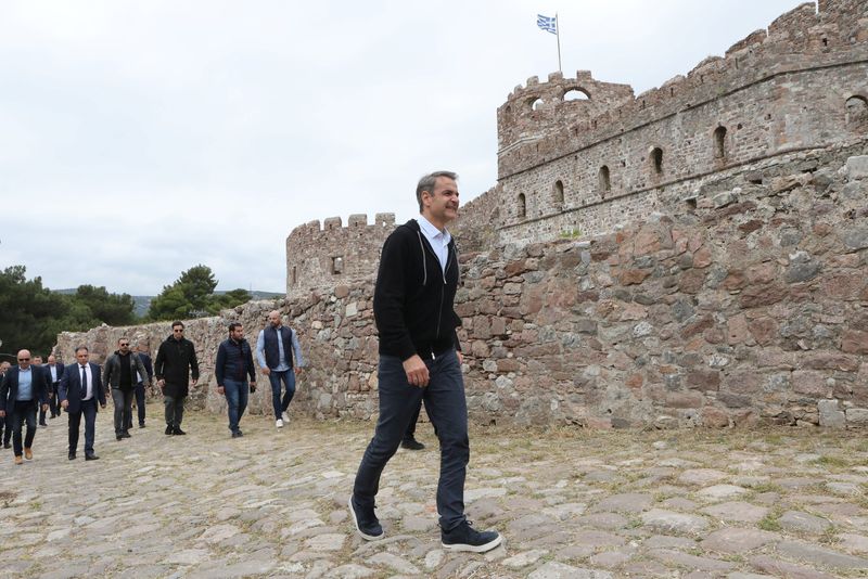 &copy; Reuters. Greek Prime Minister Kyriakos Mitsotakis walks during a campaign event on the island of Lesbos, Greece May 12, 2023. REUTERS/Elias Marcou