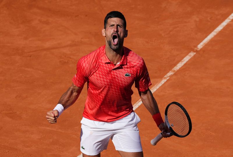 &copy; Reuters. Novak Djokovic vibra durante partida do Aberto da Itália em Roma
14/05/2023 REUTERS/Aleksandra Szmigiel