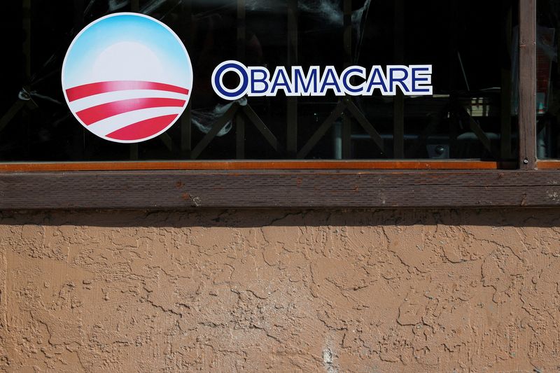 &copy; Reuters. FILE PHOTO: A sign on an insurance store advertises Obamacare in San Ysidro, San Diego, California, U.S., October 26, 2017. REUTERS/Mike Blake