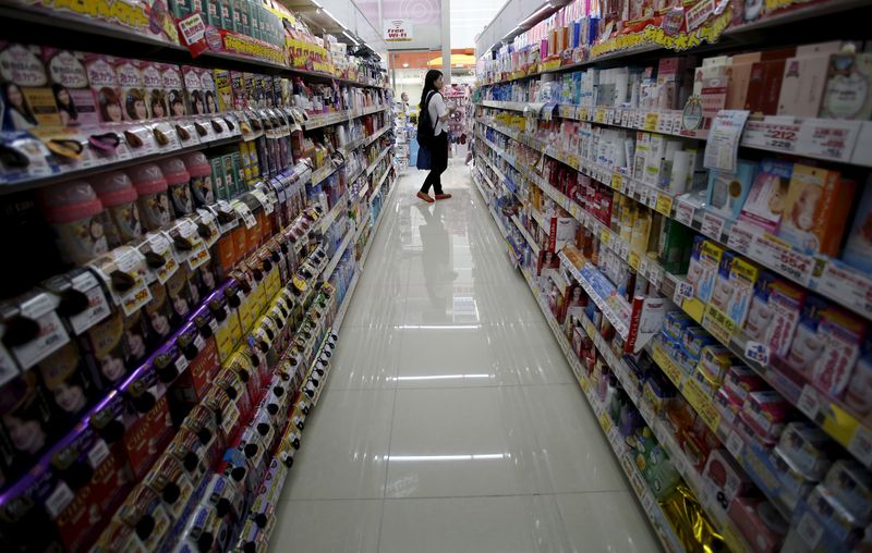 &copy; Reuters. FILE PHOTO: A shopper looks at items at a drug store in Tokyo, Japan, May 28, 2015.  REUTERS/Yuya Shino