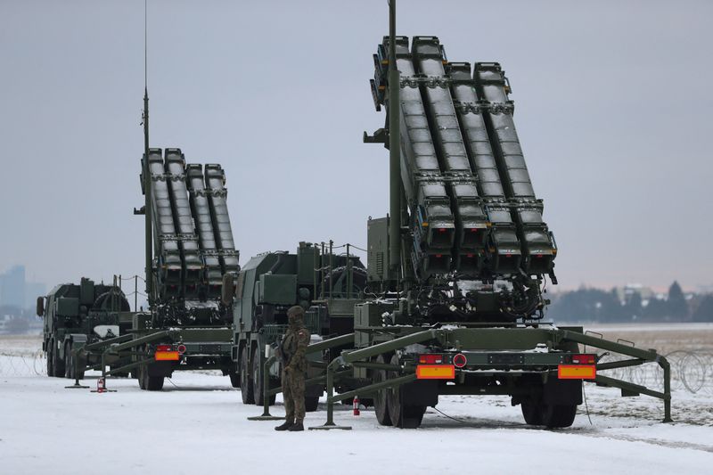 &copy; Reuters. FILE PHOTO: Serviceman patrols in front of the Patriot air defence system during Polish military training on the missile systems at the airport in Warsaw, Poland February 7, 2023. REUTERS/Kacper Pempel