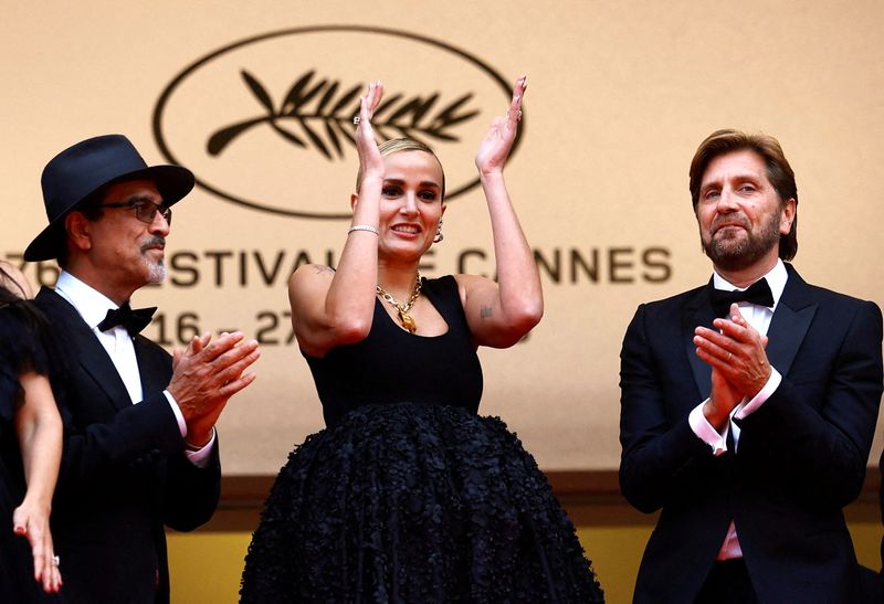 &copy; Reuters. FILE PHOTO: The 76th Cannes Film Festival - Opening ceremony and screening of the film "Jeanne du Barry" Out of competition - Red Carpet arrivals - Cannes, France, May 16, 2023. Jury members Atiq Rahimi and Julia Ducournau and Ruben Ostlund, Jury Presiden