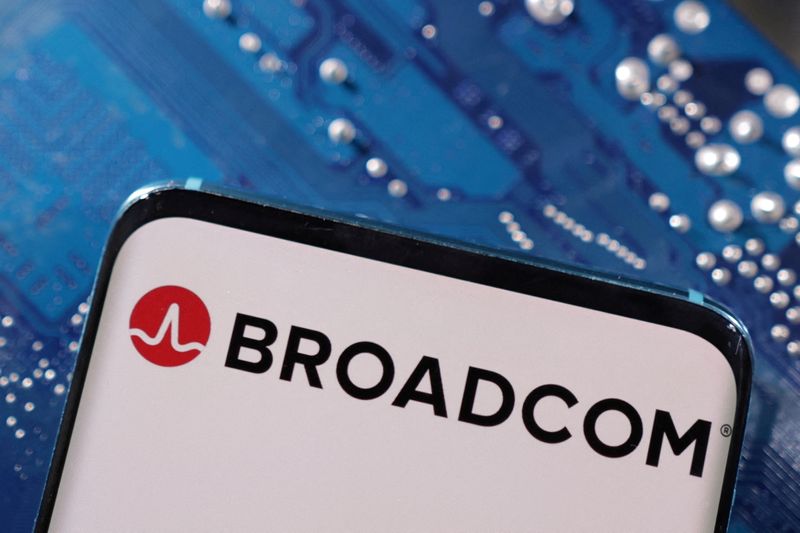 &copy; Reuters. FILE PHOTO: A smartphone with a displayed Broadcom logo is placed on a computer motherboard in this illustration taken March 6, 2023. REUTERS/Dado Ruvic/Illustration/