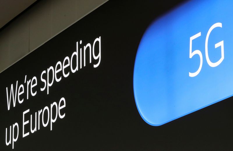&copy; Reuters. FILE PHOTO: An advertising board shows a 5G logo at the International Airport in Zaventem, Belgium May 4, 2020. Picture taken May 4, 2020. REUTERS/Yves Herman