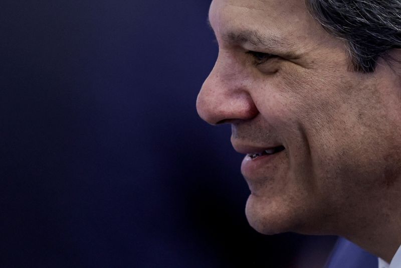 &copy; Reuters. FILE PHOTO: Brazilian Finance Minister Fernando Haddad smiles before a ministerial meeting to celebrate the first 100 days of Brazil's President Luiz Inacio Lula da Silva government at the Planalto Palace in Brasilia, Brazil April 10, 2023. REUTERS/Ueslei