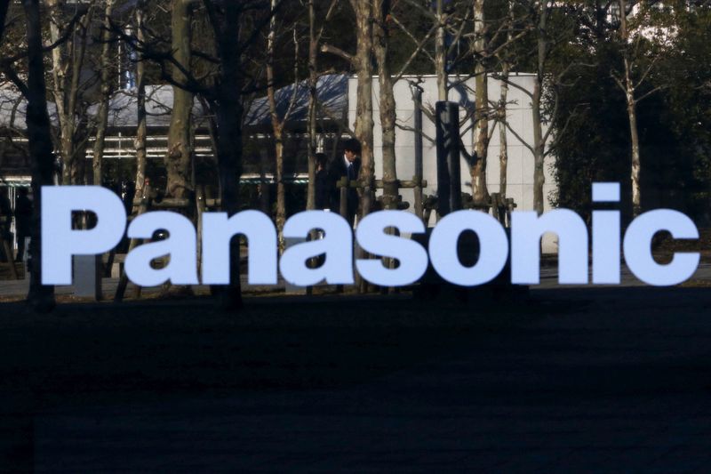 &copy; Reuters. FILE PHOTO: A pedestrian is reflected in a sign at Panasonic Center in Tokyo, Japan, Feb. 3, 2016. REUTERS/Yuya Shino/File Photo