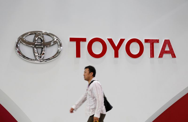 &copy; Reuters. FILE PHOTO: A man walks past a Toyota Motor Corp logo at the company's showroom in Tokyo, Japan June 14, 2016. REUTERS/Toru Hanai
