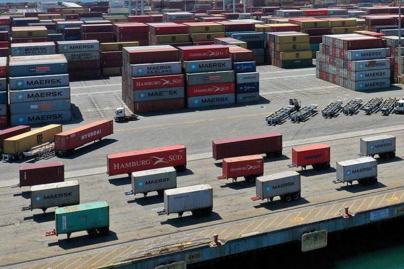 &copy; Reuters. FILE PHOTO: Containers are seen on a shipping dock, as the global outbreak of the coronavirus disease (COVID-19) continues, in the Port of Los Angeles, California, U.S., April 16, 2020.  REUTERS/Lucy Nicholson/