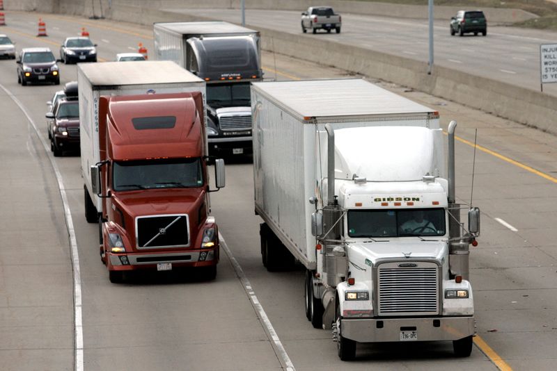 &copy; Reuters. FILE PHOTO: Two freight trucks are driven on a freeway in Detroit, Michigan, U.S. March 27, 2009. REUTERS/Rebecca Cook/File Photo