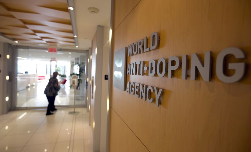 &copy; Reuters. FILE PHOTO: A woman walks into the head office of the World Anti-Doping Agency (WADA) in Montreal, Quebec, Canada November 9, 2015.  REUTERS/Christinne Muschi/File Photo/File Photo