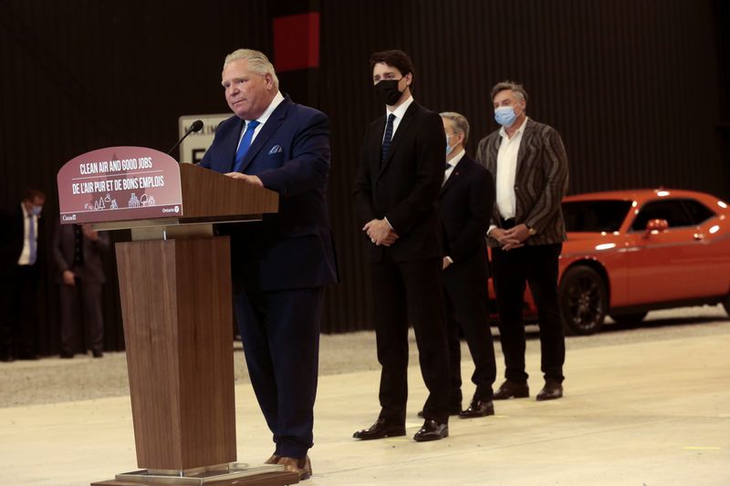 © Reuters. FILE PHOTO: Ontario's Premier Doug Ford and Canada's Prime Minister Justin Trudeau answer questions from the media at the Stellantis Research and Development Centre in Windsor, Ontario, Canada May 2, 2022.  REUTERS/Rebecca Cook