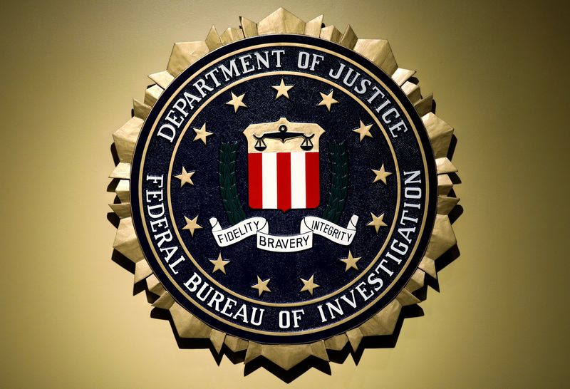 &copy; Reuters. FILE PHOTO: The Federal Bureau of Investigation seal is seen at FBI headquarters before a news conference by FBI Director Christopher Wray on the U.S Justice Department's inspector general's report regarding the actions of the Federal Bureau of Investigat