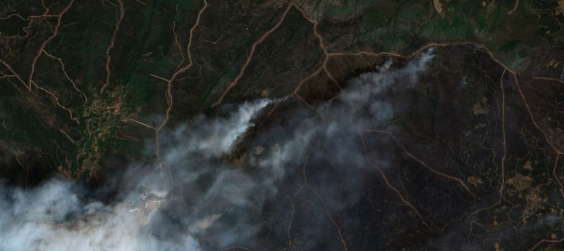 Villagers evacuated as wildfire ravages woodlands in western Spain